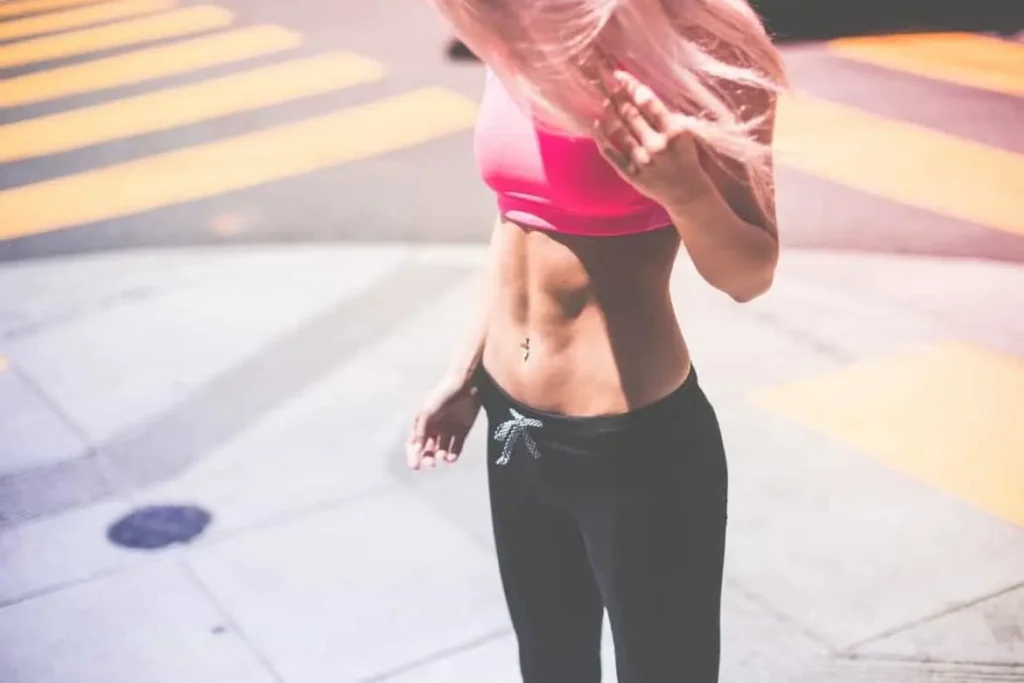 Woman with toned stomach after LA-EMS Body Sculpting Treatment Birkenhead 
